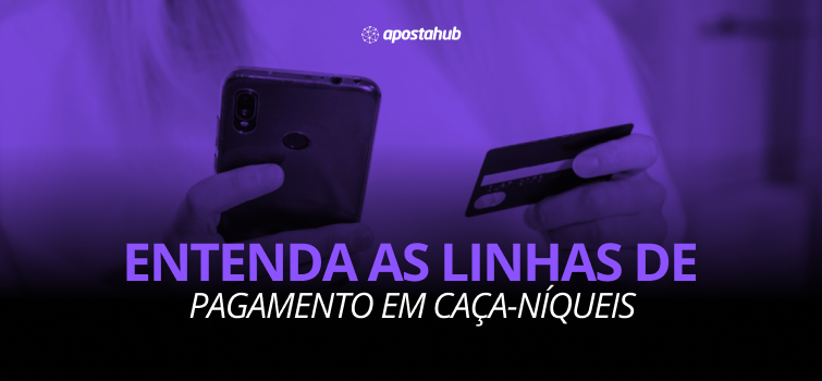 A imgem mostra duas mãos, uma segurando um celular e a outra um cartão sob um fundo roxo com o texto "Entenda as linhas de pagamento em caça-níqueis".